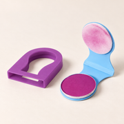 ColorSwipe purple hair chalk applicator with matching cover on an ivory background